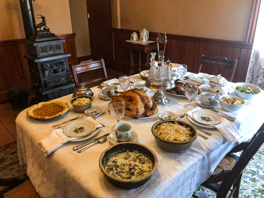 thanksgiving feast on dining room table at billings farm