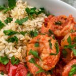 shrimp in tomato sauce over rice