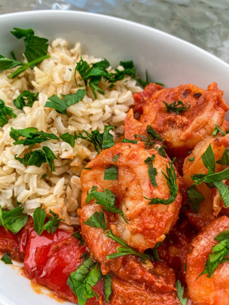 shrimp in tomato sauce over rice