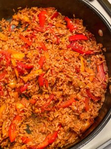 Orange rice in a pan